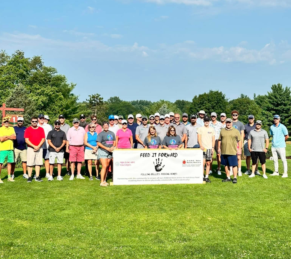 A group of golfers gathered for Feed It Forward 